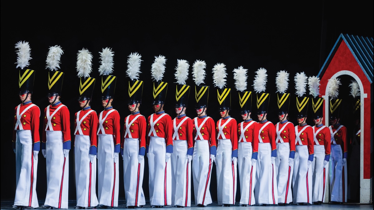 Rockettes toy soldier dancers in a line on stage